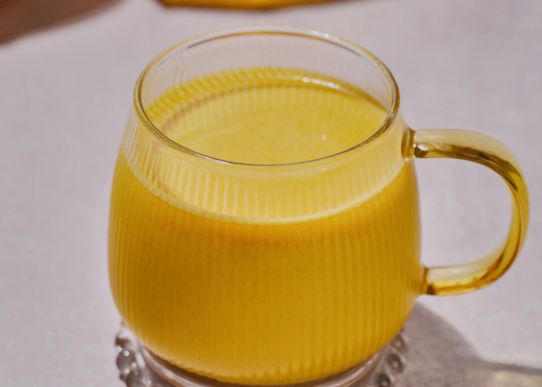 Saffron Pumpkin Spice Latte in a clear mug 