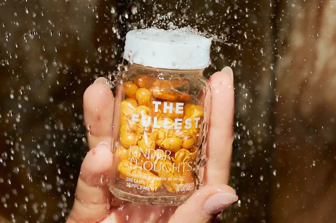 THE FULLEST Saffron Capsules shot up close with water droplets coming down 