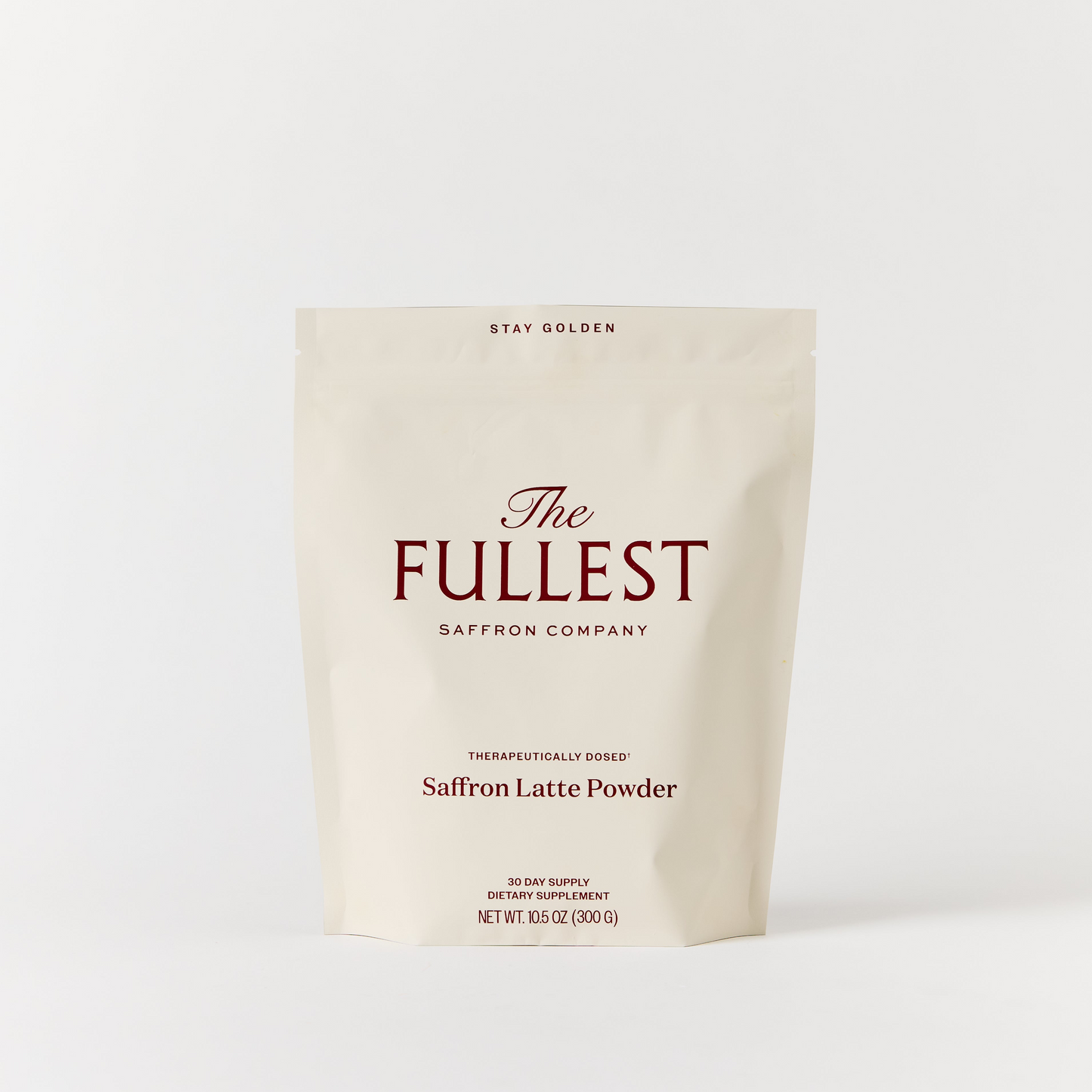 A beige resealable pouch labeled "THE FULLEST Saffron Latte 30-Day Supply," 15.9 oz (300g), is displayed against a plain white background, highlighting this delicious saffron latte blend renowned for its mood support and anxiety relief benefits.
