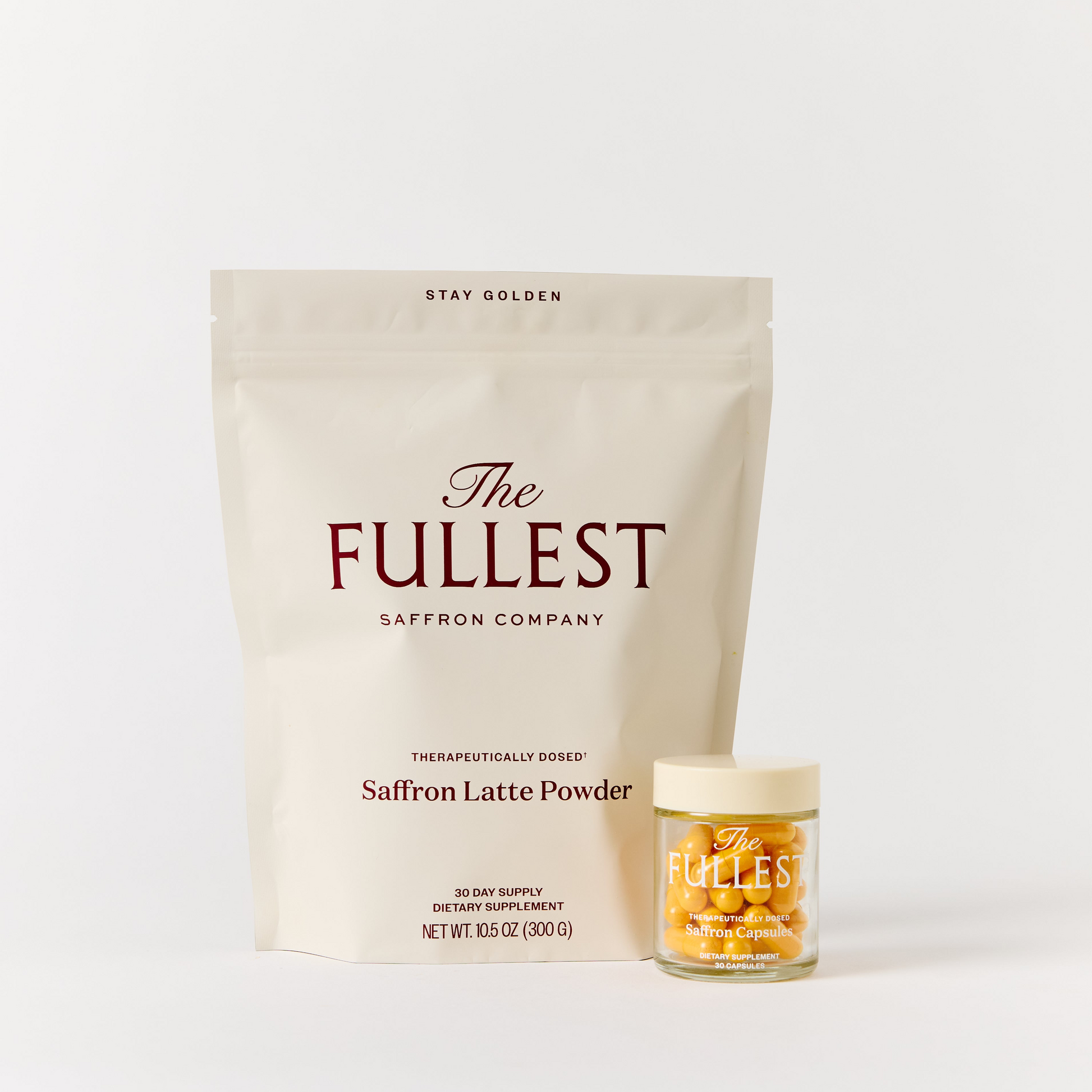 A beige pouch and a small jar, both labeled as part of the "Saffron Bundle" from THE FULLEST, are displayed on a plain light background, offering saffron supplements designed to support mood and restorative sleep.