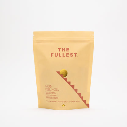 A yellow resealable pouch labeled "THE FULLEST Saffron Latte 30-Day Supply" stands upright on a white background with minimalist graphics, highlighting it as a caffeine-free dietary supplement.