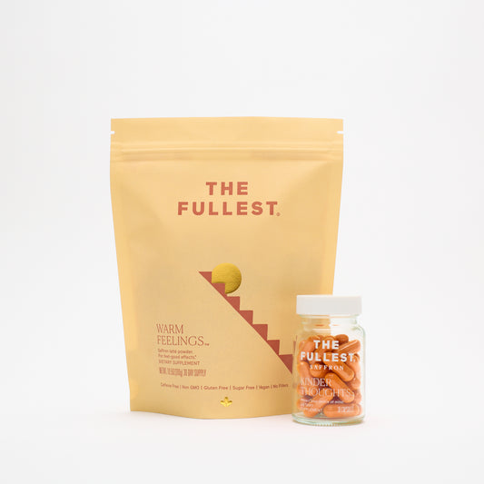 The Fullest saffron bundle with a yellow saffron latte pouch and a clear bottle of saffron capsules on a white background.