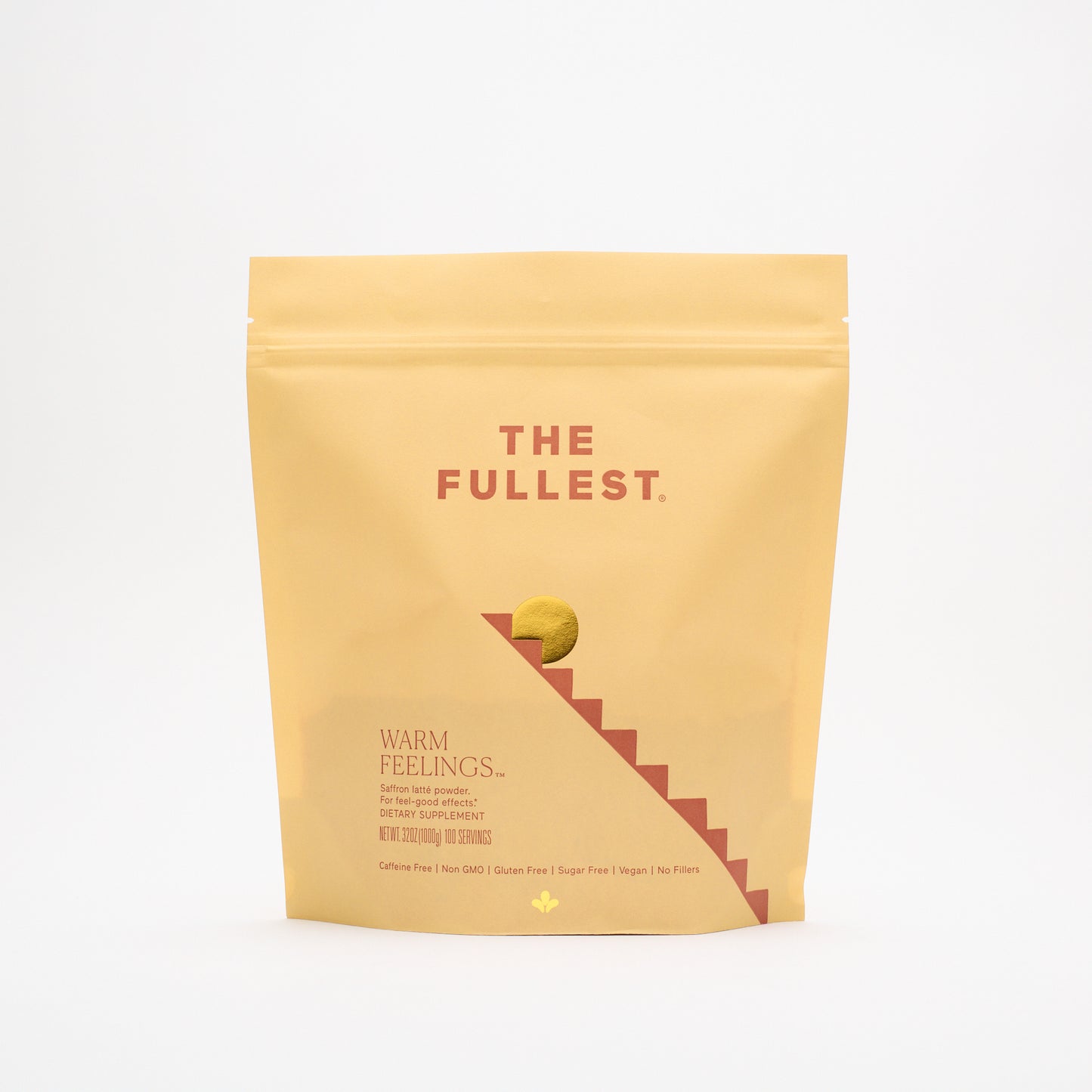 A matte yellow resealable pouch labeled “THE FULLEST.” contains the Saffron Latte 100-Day Supply, a caffeine-free blend designed to boost mood and enhance restorative sleep, with product details printed on the front.