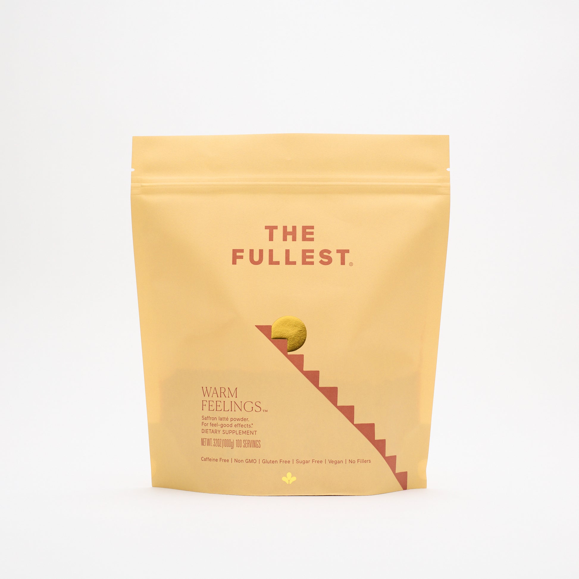 A matte yellow resealable pouch labeled “THE FULLEST.” contains the Saffron Latte 100-Day Supply, a caffeine-free blend designed to boost mood and enhance restorative sleep, with product details printed on the front.