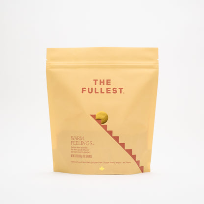 A matte yellow resealable pouch labeled “THE FULLEST.” contains the Saffron Latte 100-Day Supply, a caffeine-free blend designed to boost mood and enhance restorative sleep, with product details printed on the front.