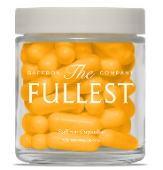 Clear glass jar filled with bright yellow capsules labeled "The Fullest Saffron Capsule" from Saffron Company.