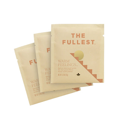 Three beige sachets labeled "THE FULLEST" with a minimalist design, arranged in a fanned-out stack on a white background, display the Saffron Latte Sachet 3-Day Supply from THE FULLEST.